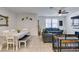 Inviting living space featuring an open layout, seamlessly connecting the dining area and living room at 1200 Mission View Ct, Henderson, NV 89002