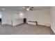 Second floor loft features a ceiling fan, neutral carpet, and plenty of space at 1200 Mission View Ct, Henderson, NV 89002