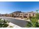 Street view of townhomes featuring desert landscaping and mountain views at 1200 Mission View Ct, Henderson, NV 89002