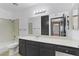 Bathroom featuring a combined bathtub and shower, toilet, and vanity with dark cabinets and a marble countertop at 1390 Vegas Valley Dr # 26, Las Vegas, NV 89169