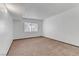 Spacious bedroom with plush neutral carpeting and bright natural light from the window at 1390 Vegas Valley Dr # 26, Las Vegas, NV 89169