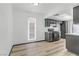 Chic dining area with grey cabinets, and an open view to the modern kitchen at 1390 Vegas Valley Dr # 26, Las Vegas, NV 89169