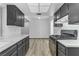 Modern kitchen featuring sleek countertops, black cabinets, and stainless steel appliances at 1390 Vegas Valley Dr # 26, Las Vegas, NV 89169
