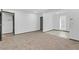 Bright living room featuring neutral decor, a large window, and ample space for personalization at 1390 Vegas Valley Dr # 26, Las Vegas, NV 89169