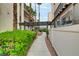 Community walkway with a wooden pergola and lush greenery at 1390 Vegas Valley Dr # 26, Las Vegas, NV 89169