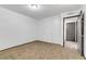 Bedroom featuring neutral carpet and a closet with sliding doors at 1390 Vegas Valley Dr # 32, Las Vegas, NV 89169
