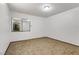 Bedroom featuring neutral carpet and window with natural light at 1390 Vegas Valley Dr # 32, Las Vegas, NV 89169