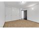 Bedroom featuring neutral carpet and a closet with sliding doors at 1390 Vegas Valley Dr # 32, Las Vegas, NV 89169