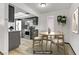Updated kitchen featuring stainless steel appliances, gray cabinets and a dining nook for seating at 1390 Vegas Valley Dr # 32, Las Vegas, NV 89169