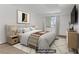 Comfortable main bedroom featuring neutral tones, a cozy rug and stylish modern furniture at 1390 Vegas Valley Dr # 32, Las Vegas, NV 89169