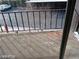 View from the balcony overlooking the parking lot and nearby apartments, showcasing a simple outdoor space at 1405 Vegas Valley Dr # 360, Las Vegas, NV 89169