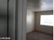 A simple bedroom featuring a window for natural light and neutral carpet at 1405 Vegas Valley Dr # 360, Las Vegas, NV 89169