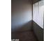 Bedroom featuring a bright window, neutral walls, and plush carpeting for a cozy and inviting atmosphere at 1405 Vegas Valley Dr # 360, Las Vegas, NV 89169