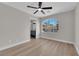 Well-lit bedroom with a ceiling fan and a view of the ensuite bathroom at 1611 Buffalo Trail Dr, Henderson, NV 89014