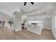 Open concept kitchen with island and stainless steel appliances at 1611 Buffalo Trail Dr, Henderson, NV 89014