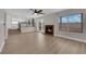Living room featuring hardwood floors and a fireplace at 1611 Buffalo Trail Dr, Henderson, NV 89014