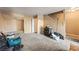 Spacious living room with carpeted floors and stairs at 1628 Justin Ct # 18, Henderson, NV 89011