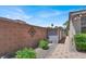 The backyard has extra storage with a shed and plenty of room for outdoor activities at 1763 Crystal Stream Ave, Henderson, NV 89012