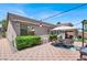 The backyard features a patio, landscaping, and outdoor seating for relaxation and entertainment at 1763 Crystal Stream Ave, Henderson, NV 89012