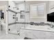 Luxurious bathroom featuring a glass shower, tub, and stylish tile at 1763 Crystal Stream Ave, Henderson, NV 89012
