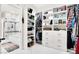 Walk-in closet with custom shelving and storage solutions, leading to bathroom at 1763 Crystal Stream Ave, Henderson, NV 89012