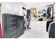 Organized walk-in closet with custom shelving and storage at 1763 Crystal Stream Ave, Henderson, NV 89012