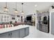 A seamless transition from kitchen to game room makes entertaining a breeze in this open floor plan at 1763 Crystal Stream Ave, Henderson, NV 89012