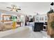 Open-concept living area with tile floors, modern furniture, and a comfortable seating area at 1763 Crystal Stream Ave, Henderson, NV 89012