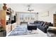 Bright living room with modern furniture, a large sectional sofa, and sleek decor at 1763 Crystal Stream Ave, Henderson, NV 89012