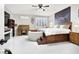 Spacious main bedroom features a comfortable bed, shutters, and lots of natural light at 1763 Crystal Stream Ave, Henderson, NV 89012
