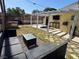 Relaxing backyard featuring comfortable patio seating and a covered pergola area at 1819 Beverly Way, Las Vegas, NV 89104