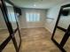 Bedroom featuring tile floors, a tv, and natural lighting at 1819 Beverly Way, Las Vegas, NV 89104