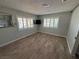 Bright bedroom features wood-look flooring and white shuttered windows at 1819 Beverly Way, Las Vegas, NV 89104