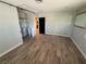 Spacious bedroom with wood-look flooring and walk-in closet at 1819 Beverly Way, Las Vegas, NV 89104