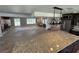 Stylish kitchen with granite countertops, stainless steel appliances, and an open layout to the living area at 1819 Beverly Way, Las Vegas, NV 89104