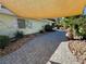 Paver walkway with rock landscaping along the side of the house at 1819 Beverly Way, Las Vegas, NV 89104