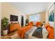 Bedroom with a modern bed frame, stylish bedding, and a colorful painting at 1828 Golden Arrow Dr, Las Vegas, NV 89169