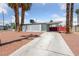 Charming single-story home featuring desert landscaping and covered parking at 1828 Golden Arrow Dr, Las Vegas, NV 89169