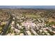 Aerial view of 2090 Eaglepath Cir in a neighborhood featuring tree-lined streets and lush landscaping at 2090 Eaglepath Cir, Henderson, NV 89074