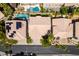 An aerial view of the property, featuring a refreshing pool and well-maintained landscaping at 2090 Eaglepath Cir, Henderson, NV 89074