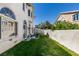 Backyard featuring well maintained lawn, patio area and basketball court at 2090 Eaglepath Cir, Henderson, NV 89074