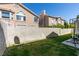 Backyard featuring well maintained lawn, privacy wall and basketball court at 2090 Eaglepath Cir, Henderson, NV 89074
