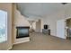Large main bedroom with vaulted ceiling, decorative fireplace, a chest of drawers, and doorway in the background at 2090 Eaglepath Cir, Henderson, NV 89074