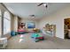 Spacious bonus room or play area with ample room for activities at 2090 Eaglepath Cir, Henderson, NV 89074