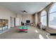Bright bonus room with neutral colors, large windows, and ample space for various activities at 2090 Eaglepath Cir, Henderson, NV 89074
