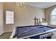 The game room boasts a pool table and is well lit at 2090 Eaglepath Cir, Henderson, NV 89074