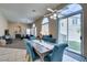 Open floor plan showing the living and dining area, plenty of natural light and access to the backyard at 2090 Eaglepath Cir, Henderson, NV 89074