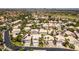 A panoramic aerial view captures the residential neighborhood with tidy streets and verdant landscaping at 2090 Eaglepath Cir, Henderson, NV 89074