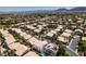 A scenic aerial view showcases the lush neighborhood, with mature trees and manicured lawns at 2090 Eaglepath Cir, Henderson, NV 89074