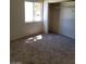 This bedroom features a walk-in closet and a window that provides natural light at 2110 Los Feliz St # 2037, Las Vegas, NV 89156